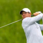 McIlroy Defeats Reed in Tense Dubai Desert Classic